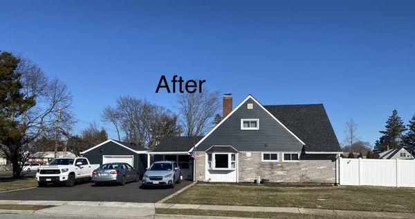 Panther completed the roof along with the siding. (I left the original stone on the bottom half of the house)