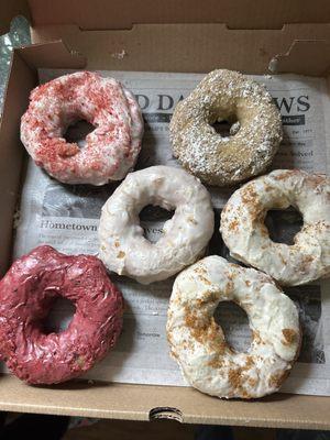 Lemon glaze with raspberry crumb, crumb cake, brown butter Biscoff crumb, mixed berry glaze and lemon zest donuts