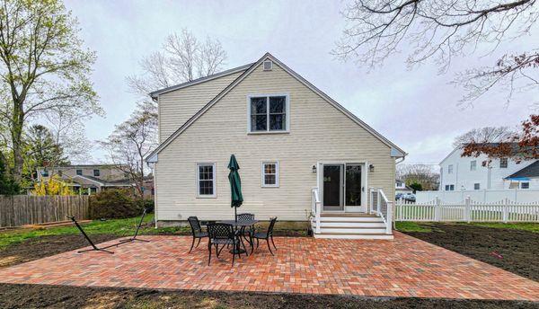 House with brick patio