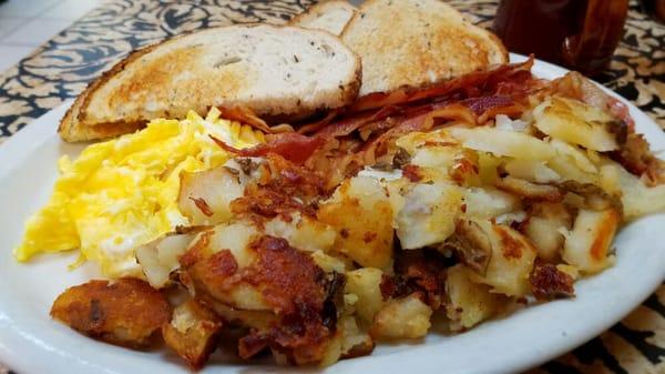 Early bird special M-F 3.89 from 7-9. From 9-11 its only 4.89! Two eggs, home-fries, bacon or sausage, toast & jelly