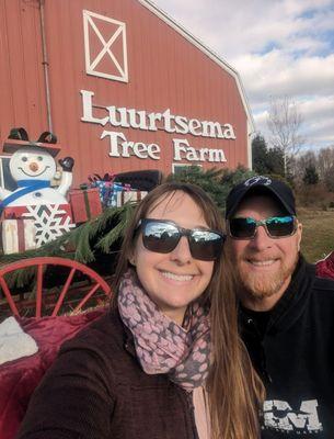 Jeff and I outside the barn getting pictures in the Santa chair