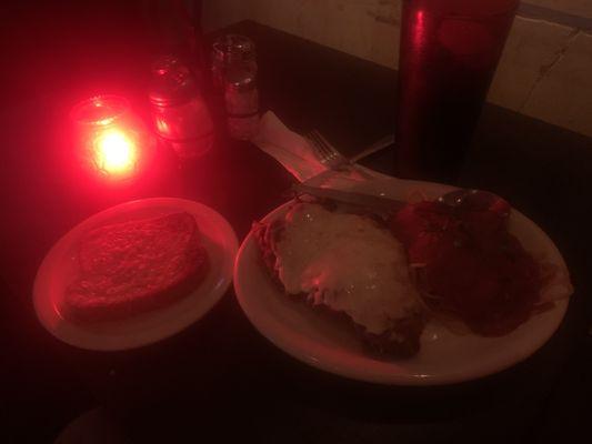 Chicken Parmesan with garlic bread