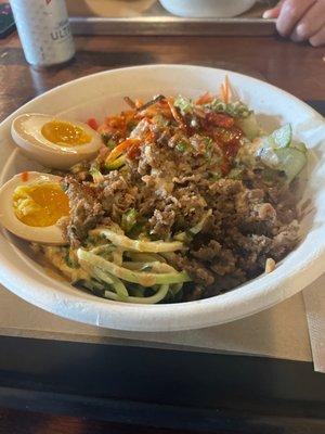 Bulgogi Bibimbap bowl with marinated egg.