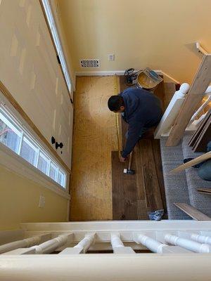 Months later, after the front door was replaced, Etowah finished the foyer and carpeting on the stairs.