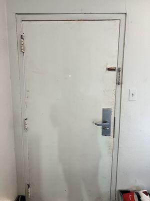 Door hinges are barely hanging in there