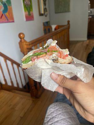 Tal Special - Tofu Lox Spread, Tomato, Lettuce, and capers on an everything Bagel