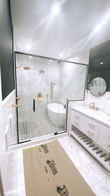 3/8 clear glass shower door with u channel all around glass.