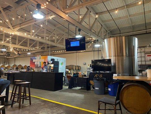 Cider bar and one of the big stainless containers