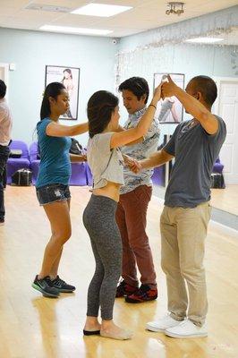 Beginners learning salsa basics