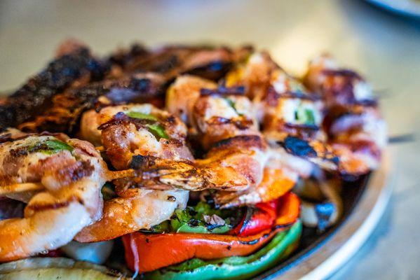 Combo Fajitas with Grilled Shrimp and Carne Asada.