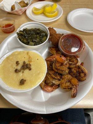 blackened shrimp, turnip greens, grits, and hush puppies