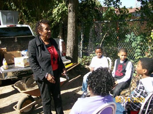 TN. State Rep. Cooper giving instruction to youth at Landmark Gardens