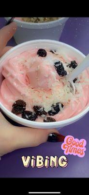 Strawberry yogurt with coconut and raisins