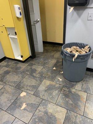 Typical view in the bathroom. Paper towels everywhere.