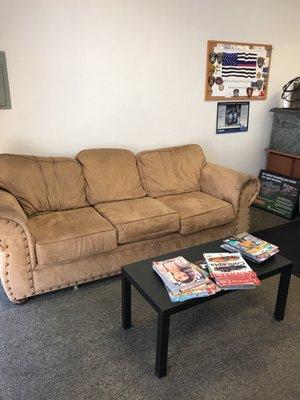 Comfortable couches in waiting area.