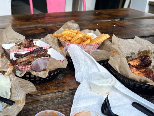 meat plate.. pull pork, brisket and a order of smoked wings.