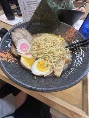 Tokyo Shoyu Ramen-Tokyo shoyu soup with chashu pork, egg, sweet corn, kikurage, bamboo, fish cake, scallion