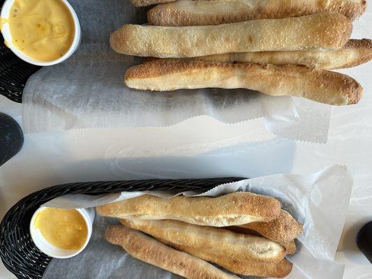 Breadsticks with cheese sauce. Nobody does them as well as Pizza Junction!