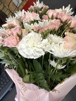 Pink roses and white flowers.