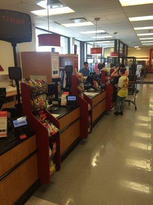 Weekend afternoon, two cashiers.