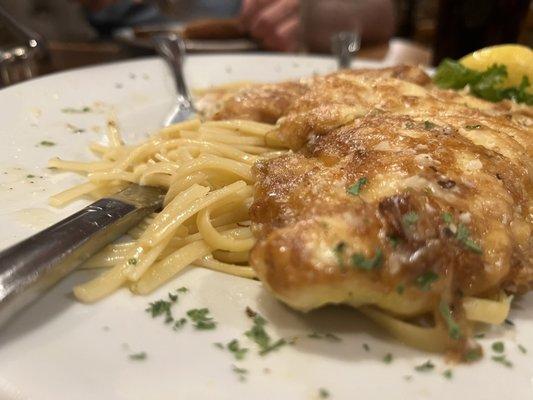 Chicken francaise over linguine