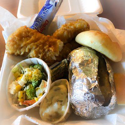 Broasted cod, broccoli slaw, baked potato, and roll.