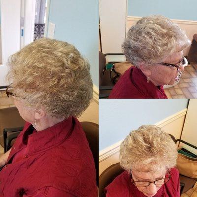 Going grey doesn't mean you have to look old! By adding high and low lights I was able to blend some natural color back into her hair.