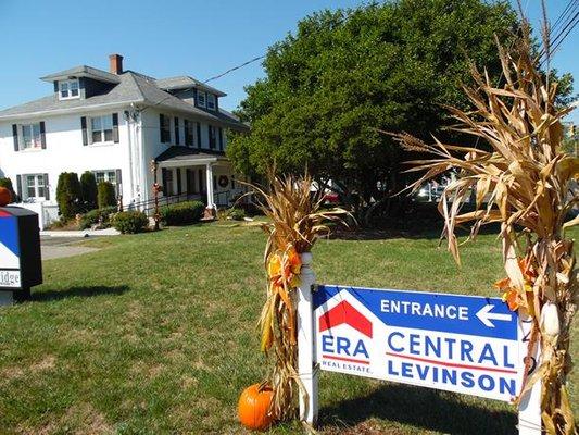 During the Fall our entrance sign with our office building in the background.