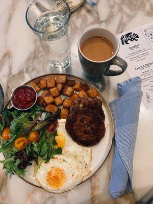 "Alyeska Rising" breakfast with over easy egg & breakfast sausage ($22)