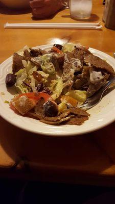 Lunch Greek salad with gyro meat comes with warm pita bread.