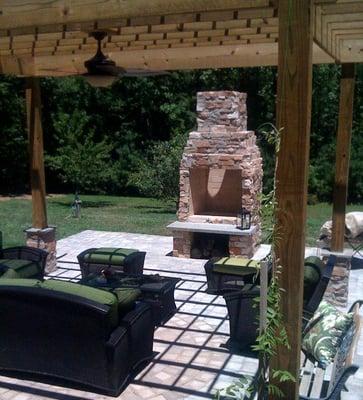 Stone fireplace and pergola