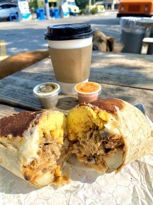 Breakfast burrito with steak and chipotle sauce.