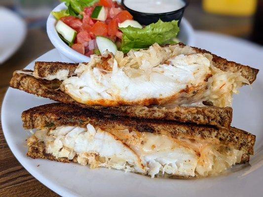 Grouper Reuben. Sauerkraut, Swiss cheese, Thousand Island dressing, marble rye. With side salad upgrade. $20.