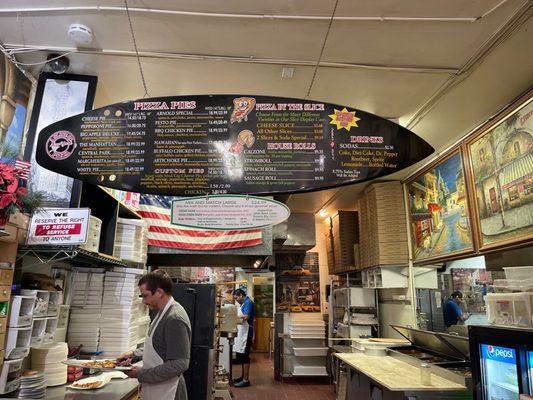 Order off the surfboard or they have paper menus to go A slice of pizza