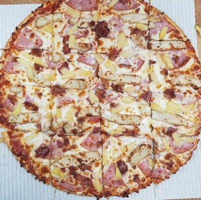 Thin crust Hawaiian - Chicken, Bacon, Ham and Pineapple.