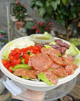 Chop salad - kalamata, roasted peppers, red wine vinaigrette, provolone, pepperoni