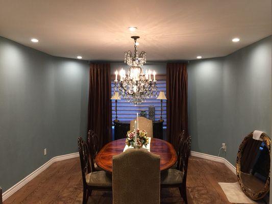 Formal dining room lighting with wall wash.