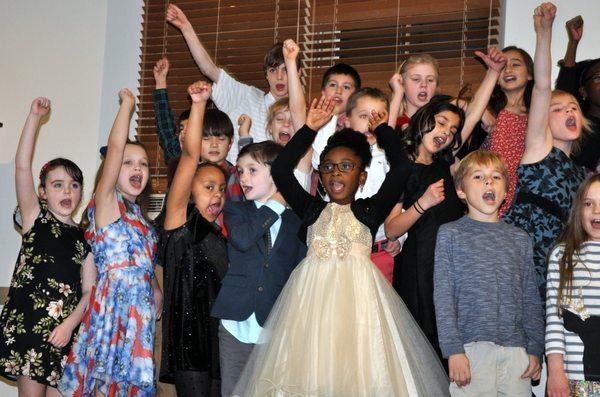 Lower school students perform at the annual Winter Concert with a live band!