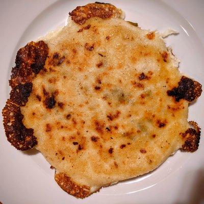 Loroco Pupusa Mozzarella cheese mix with chopped pieces of loroco, which is a Salvadorian edible flower.