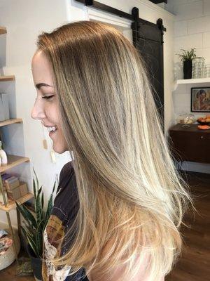 Balayage and hair painting for a natural highlight on this natural beauty