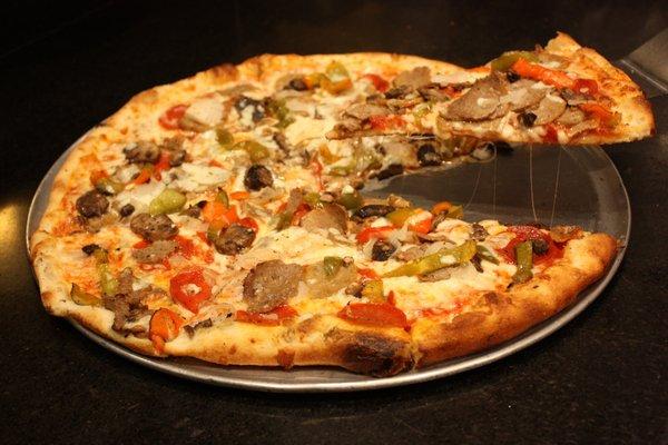 "DOMINIC'S SPECIAL" Our house special loaded with all of your FAVORITE toppings: Pepperoni, Meatball, Sausage, Peppers, Mushrooms, Onions.