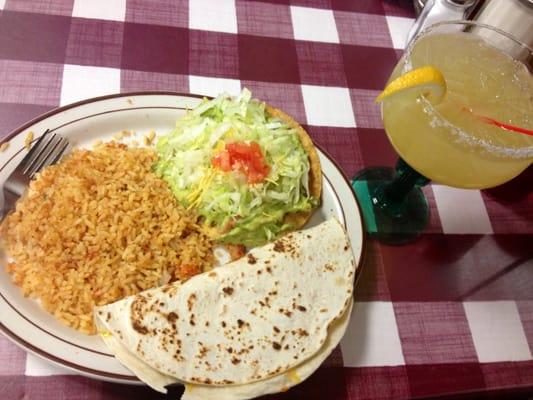 Delicious rice, guacamole tostada, quesadilla, and a marg!