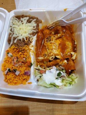 3 enchiladas with a side of rice and beans