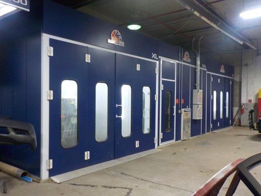 2 fully enclosed downdraft extra large paint booths.  Delivers top quality paint application.