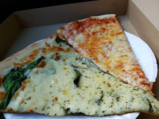 Spinach garlic white pizza on the left, cheese on the right