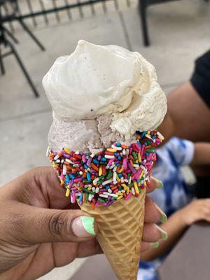 Sprinkle Cone Double Scoop with cookie dough and cookies and Cream! Add the Malt ball to keep the cone from running.