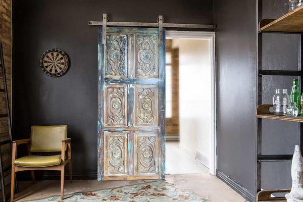 Mogul interior Vintage carved barn doors