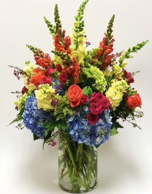 Spectacular Day 19MD1 $150.00 
 
 Bold and beautiful bouquet with hydrangeas, snap dragons, roses and more