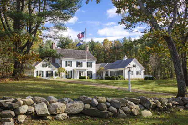 This Federal Colonial farmhouse was inspired by the 300-year-old homesteads surrounding it, conceived to look as if it expanded over time