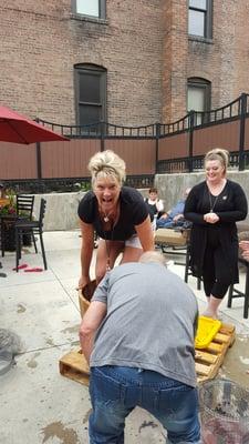 More wine stomping...two of our staff helping out! They love their work!